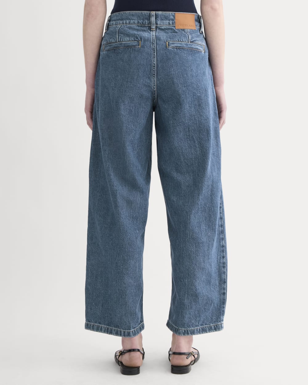 The High Rise Pleated Jean | Mid Indigo