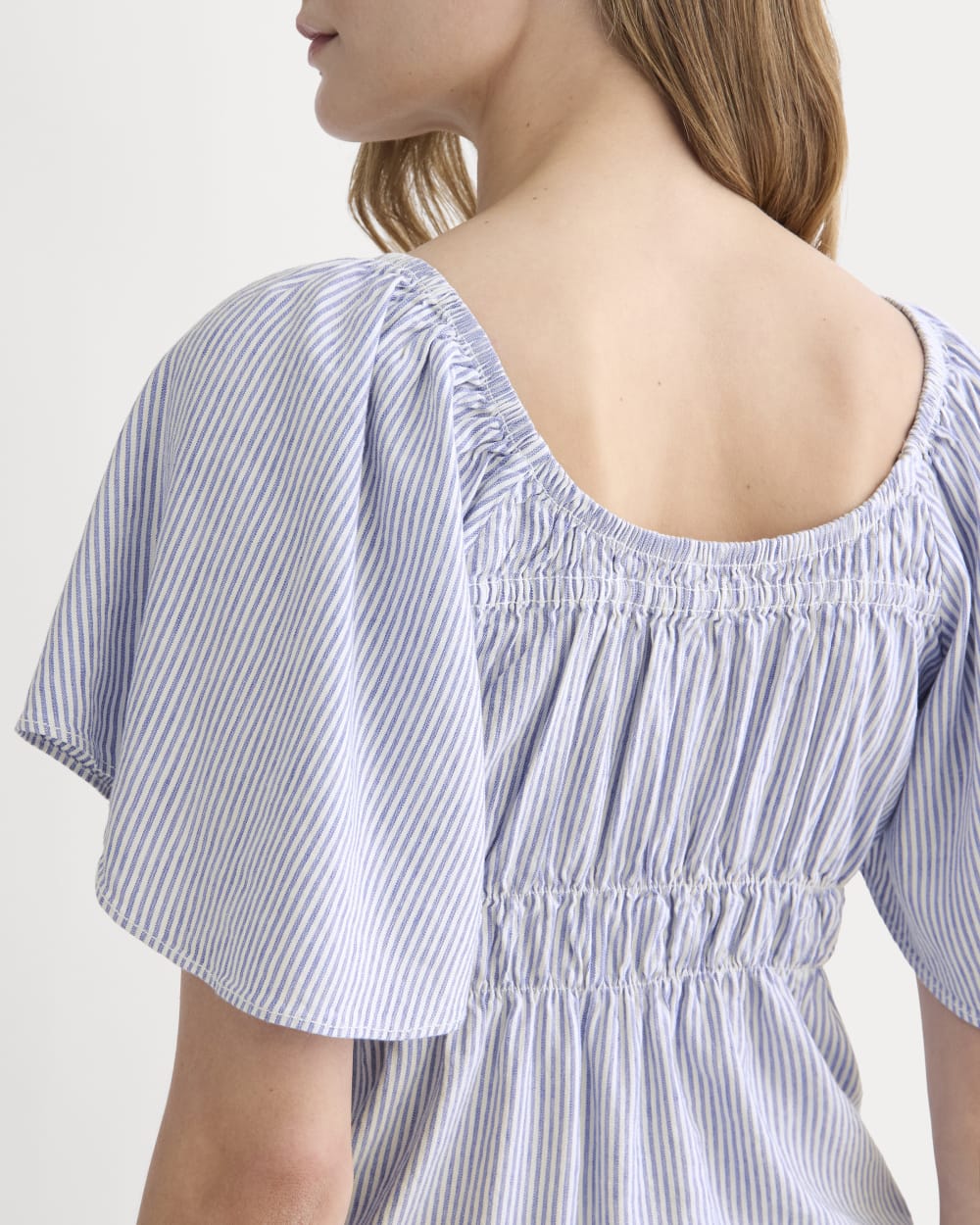 The Flutter-Sleeve Top in Stretch Linen | White / Dutch Blue