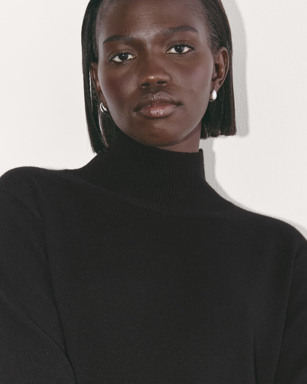 The Turtleneck Sweater Dress in Cashmere | Black
