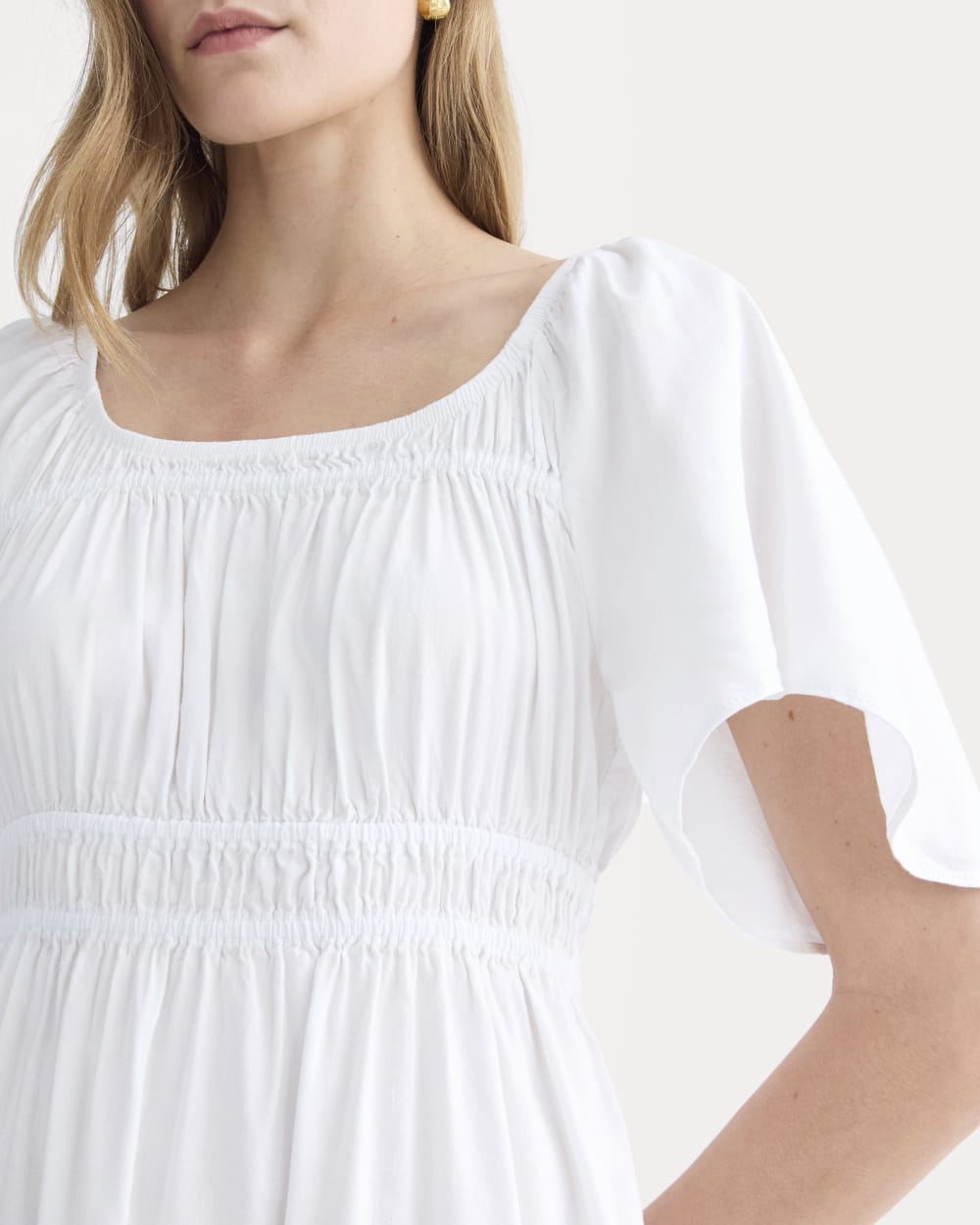The Flutter-Sleeve Dress in Stretch Linen | White