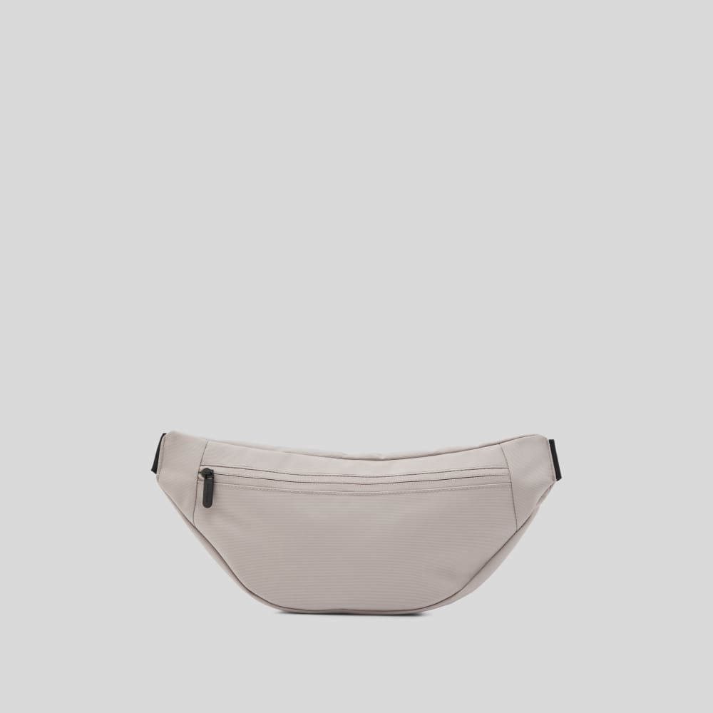 The Renew Transit Fanny Pack | Warm Quartz (with label)